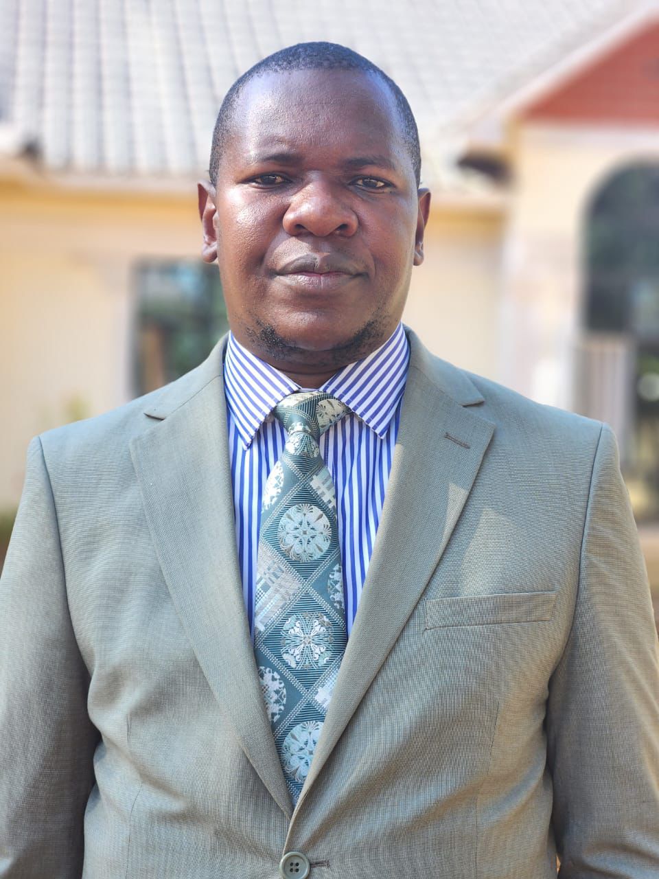 Hon. Denis Okinda
